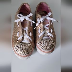 Twinkle toes Shoes. It's still good and still lights up.